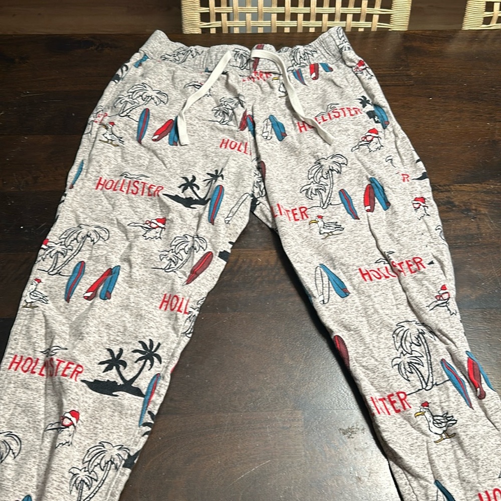 Hollister pajama pants, grey with designs of pelicans, surfboards and palm trees